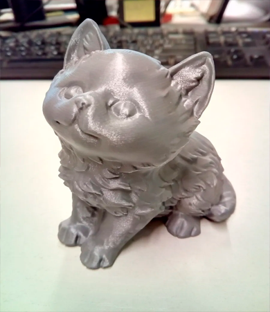 3D-модель котенка представляет собой цифровую копию маленького кота, оптимизированную для печати на 3D-принтере.